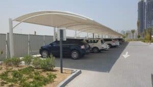 Modern parking shade installation in Karachi providing sun and rain protection for vehicles